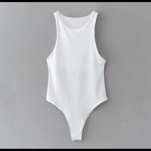 COPY - Sleeveless white bodysuit.